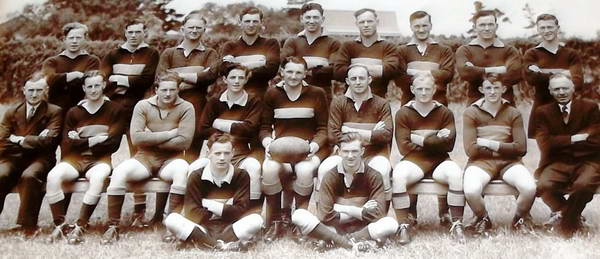 Inverleigh 1949 premiers (John fourth from left in middle row). Captain Rob Wishart with ball. Ivan Witcombe (fourth from right in back row). (Inverleigh Mechanics Institute Hall)